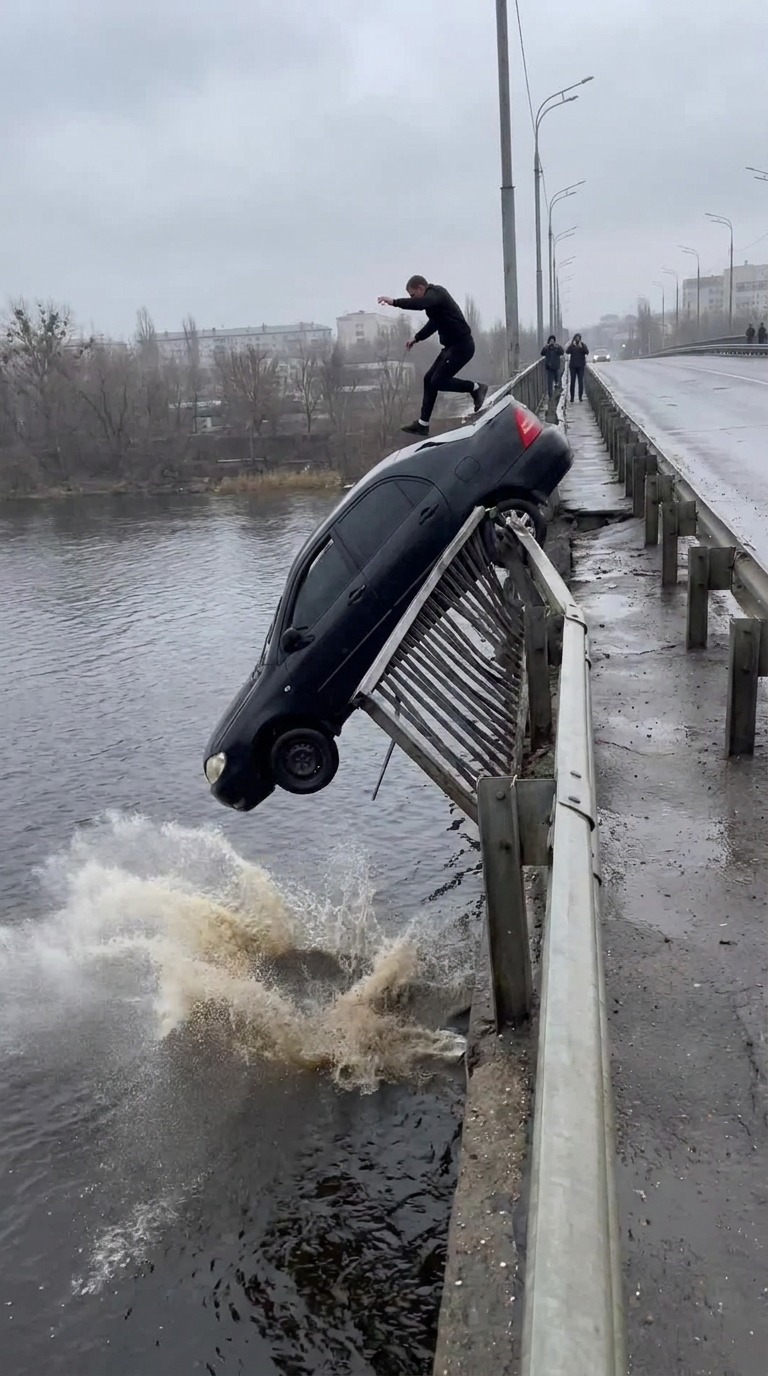 Car Falling Off Bridge Into Water AI video prompt