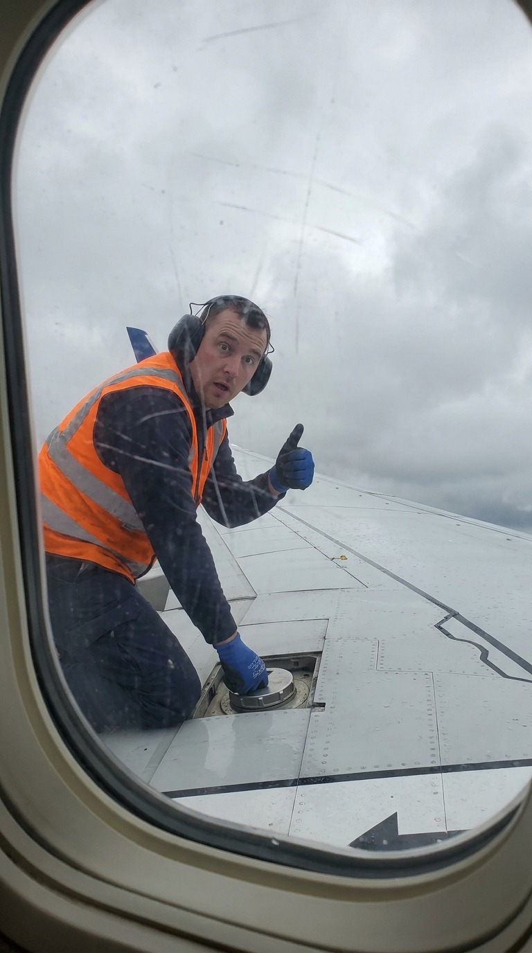 Airplane Wing Mechanic POV AI video prompt